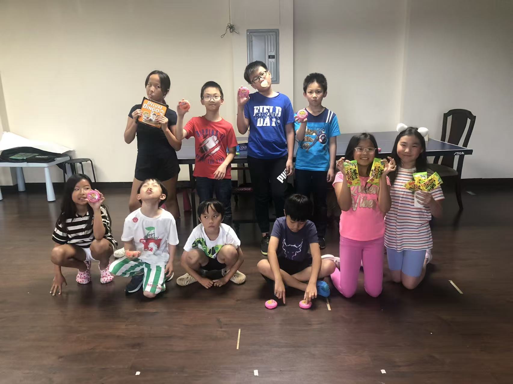 AAA summer campers celebrating together with prizes and treats